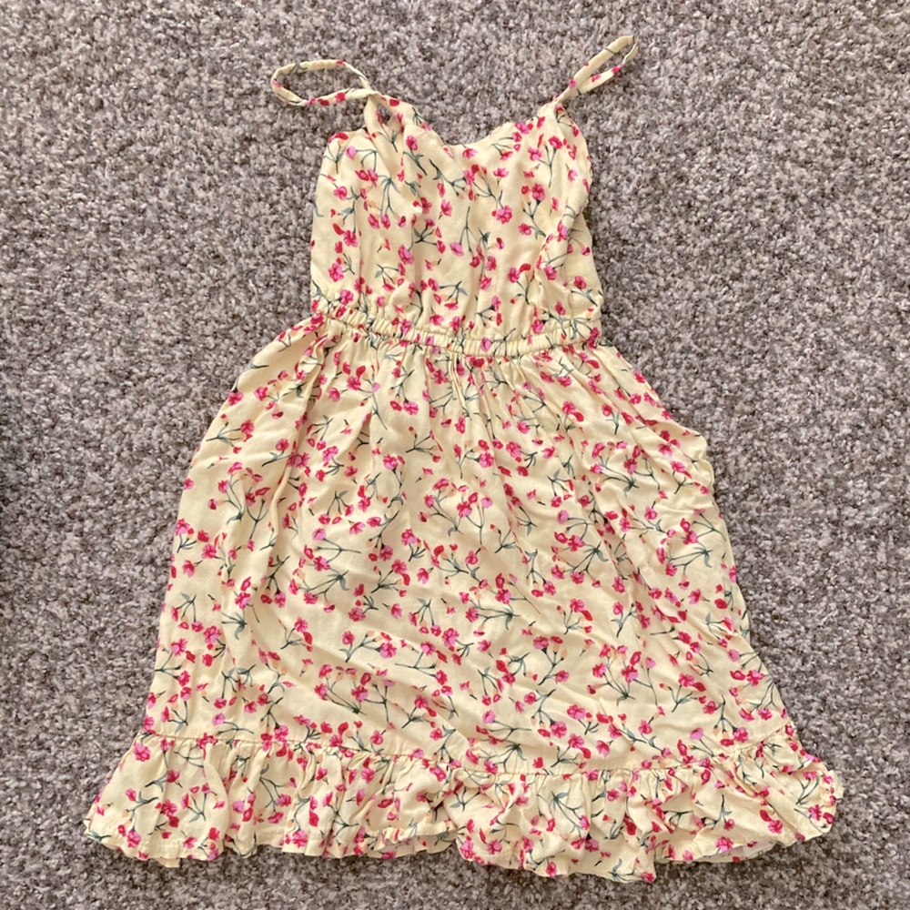Set of floral dresses, no tags. Fits girls size 8 at most
